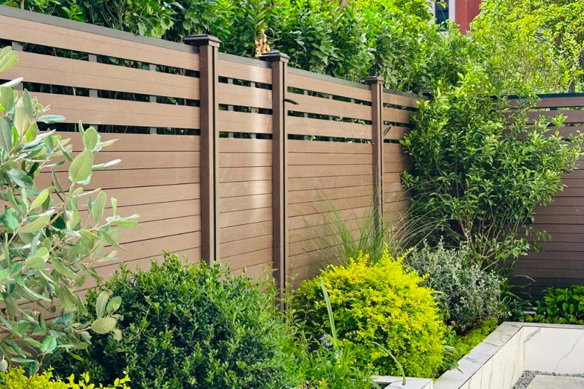 wpc-fence-panel-in-green-grass